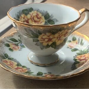 Elegant Floral Teacup and Saucer Set